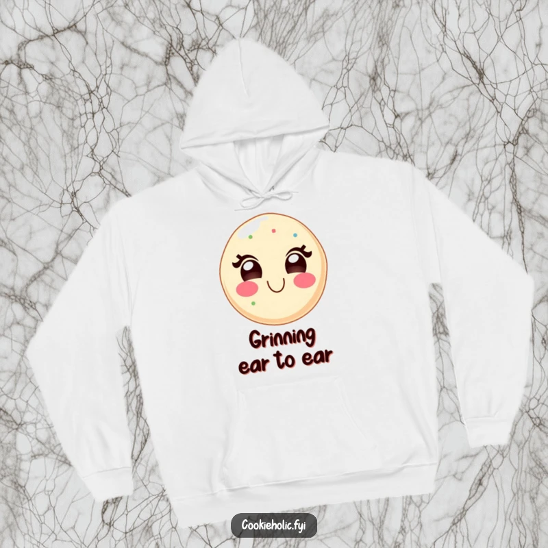 Funny, cozy hoodie featuring a kawaii sugar cookie character with a huge, delighted grin, perfect for conveying sweet happiness.