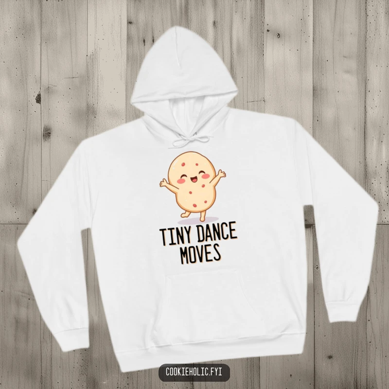 Funny hoodie featuring a delighted sugar cookie performing a tiny, energetic dance, offering cozy comfort and joyful spirit.